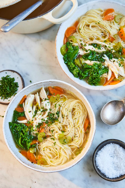 Picture of bowls of chicken noodle soup and Maldon Salt