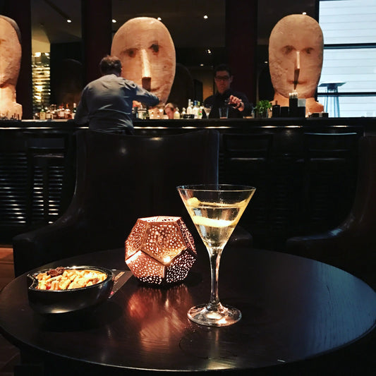 Picture of cocktail in a glass on a bar table