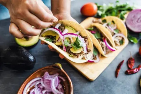picture of tacos filled with food