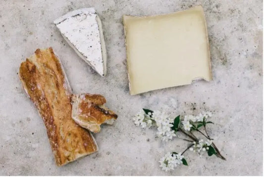 picture of cheeses on a board