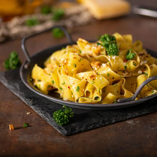 Italian pasta with olive oil and herbs